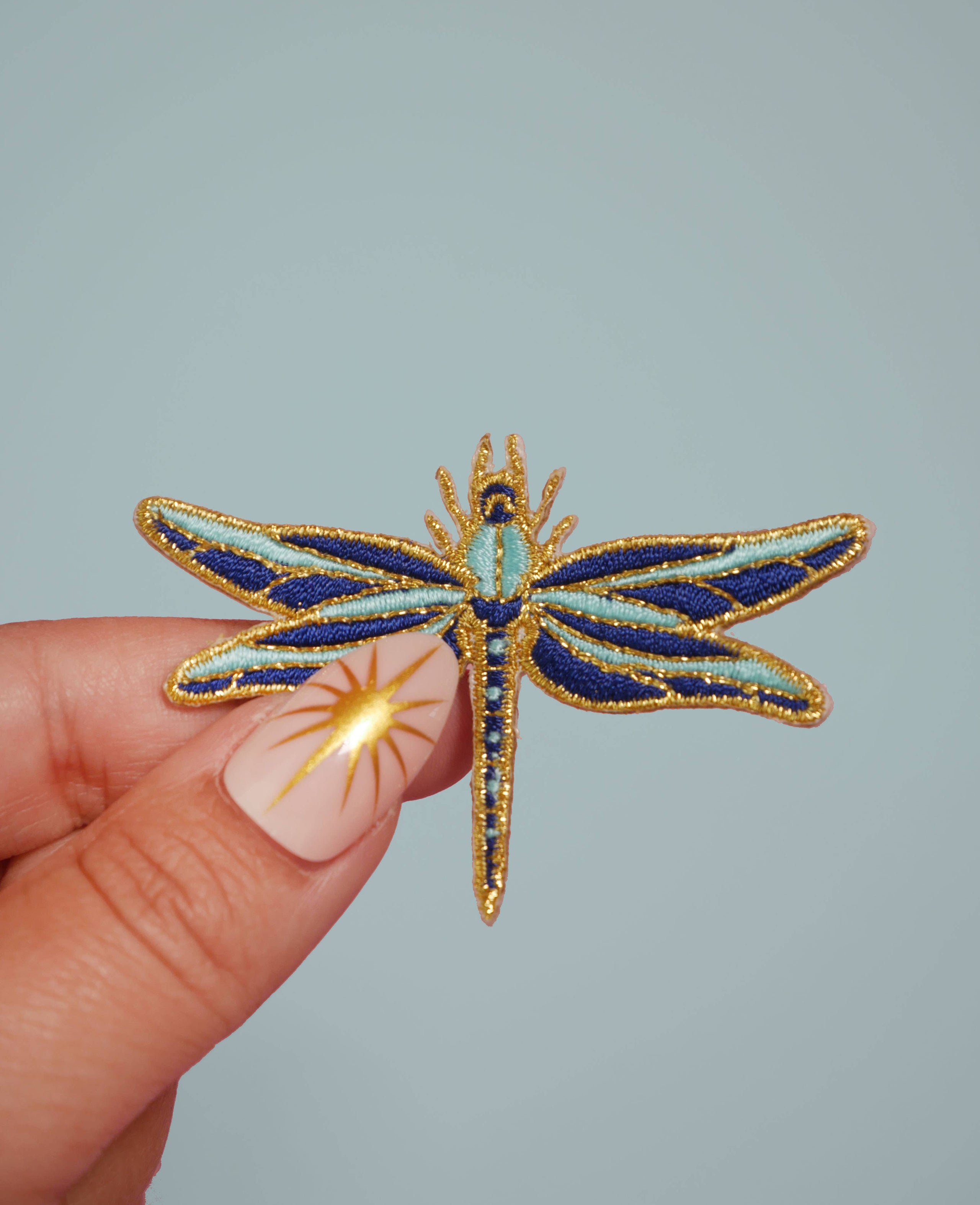 Toppa da stirare a forma di libellula