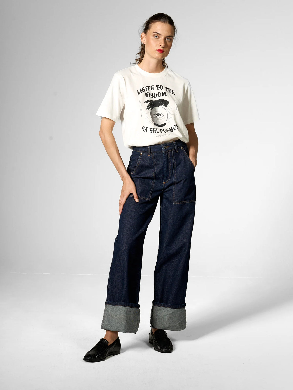 Jeans con tasche applicate in cotone biologico