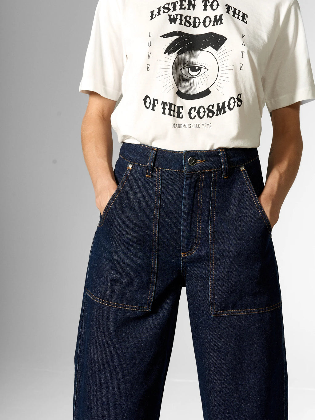 Jeans con tasche applicate in cotone biologico