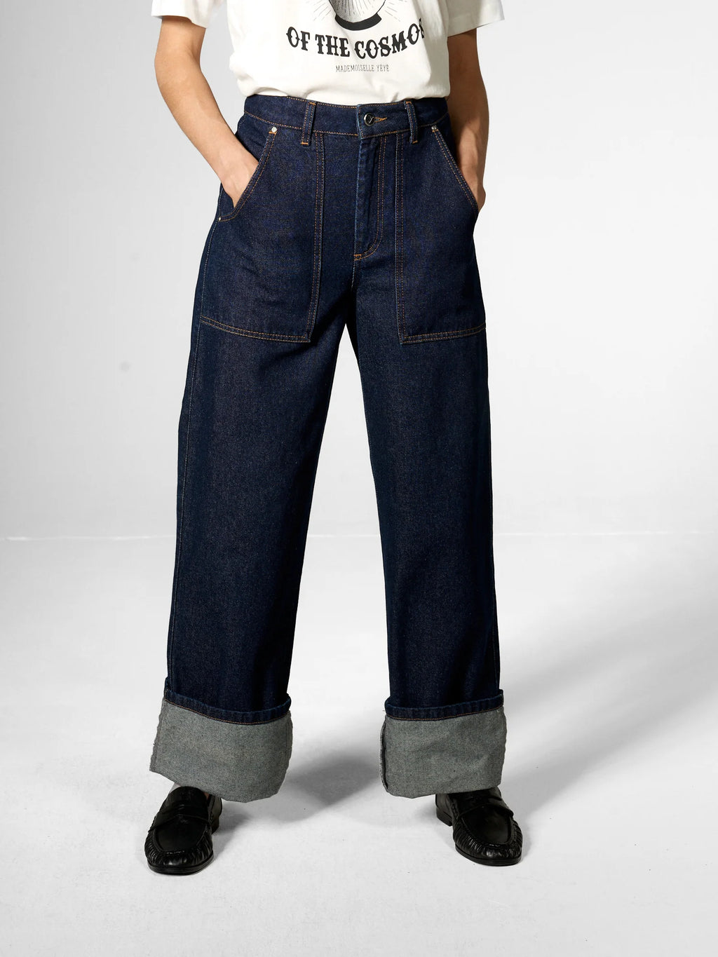 Jeans con tasche applicate in cotone biologico