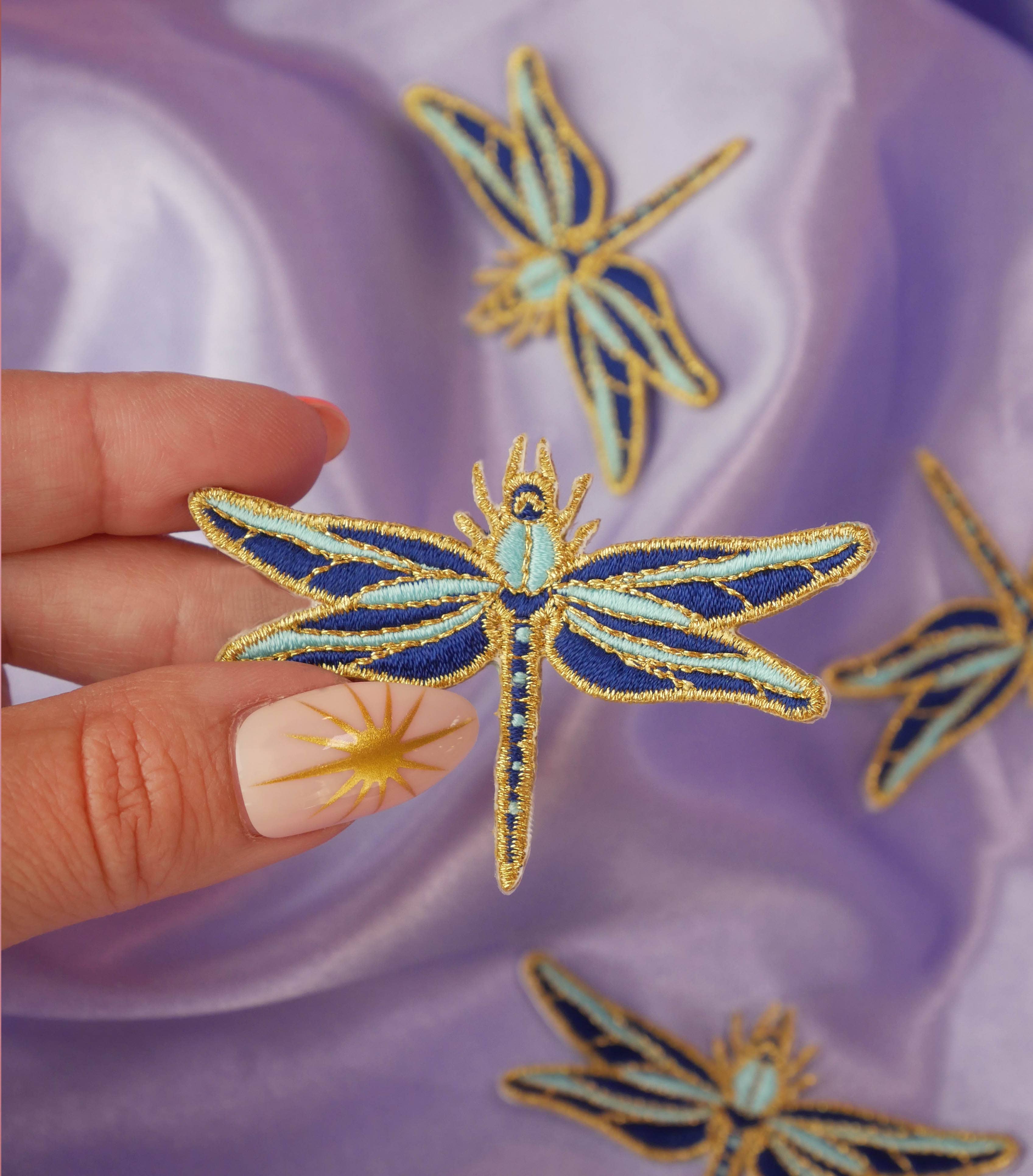 Toppa da stirare a forma di libellula