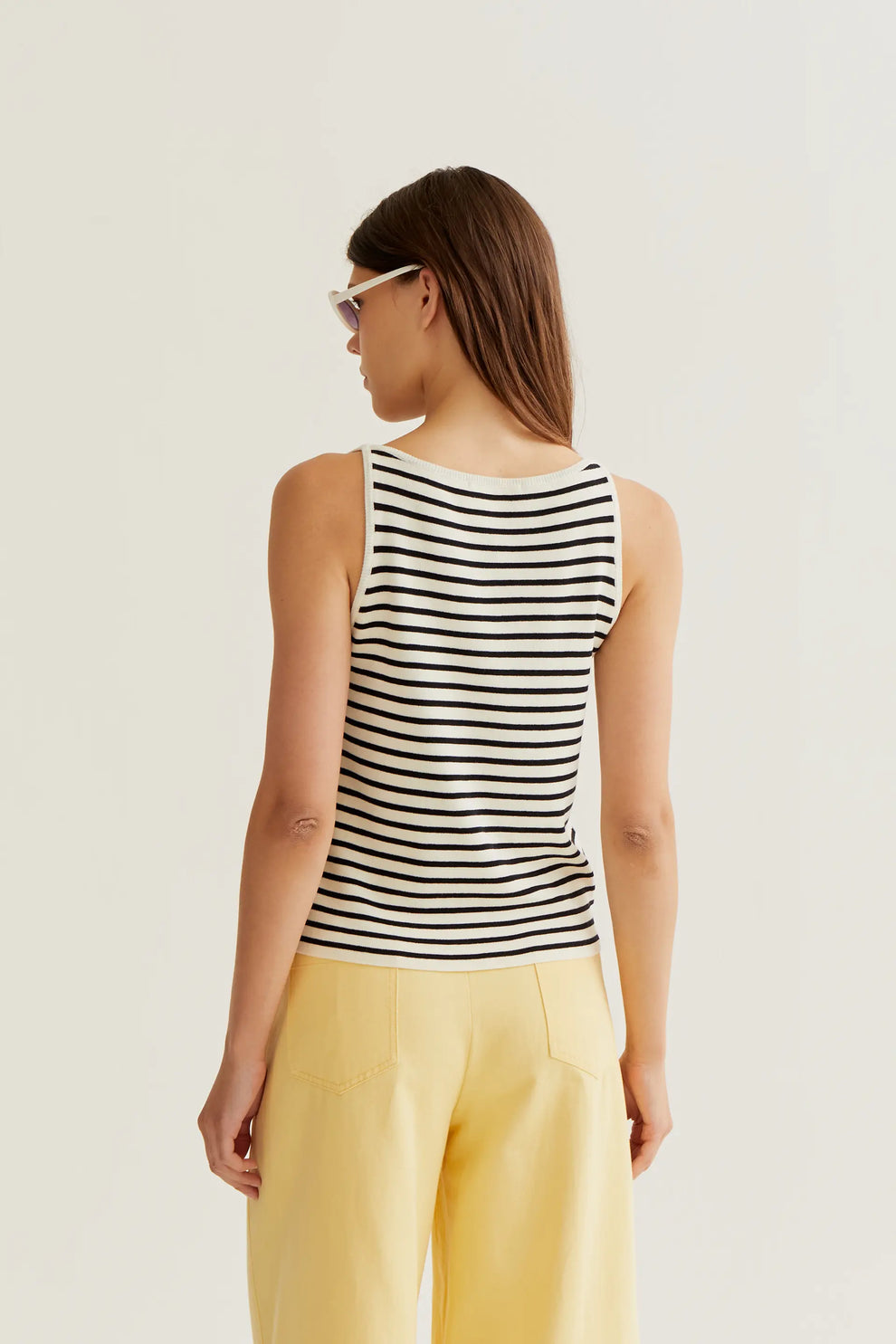 Black and white striped top with banana embroidery