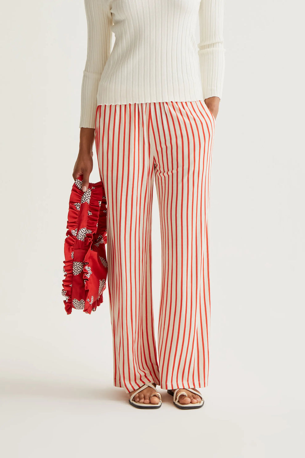 Trousers with red striped print