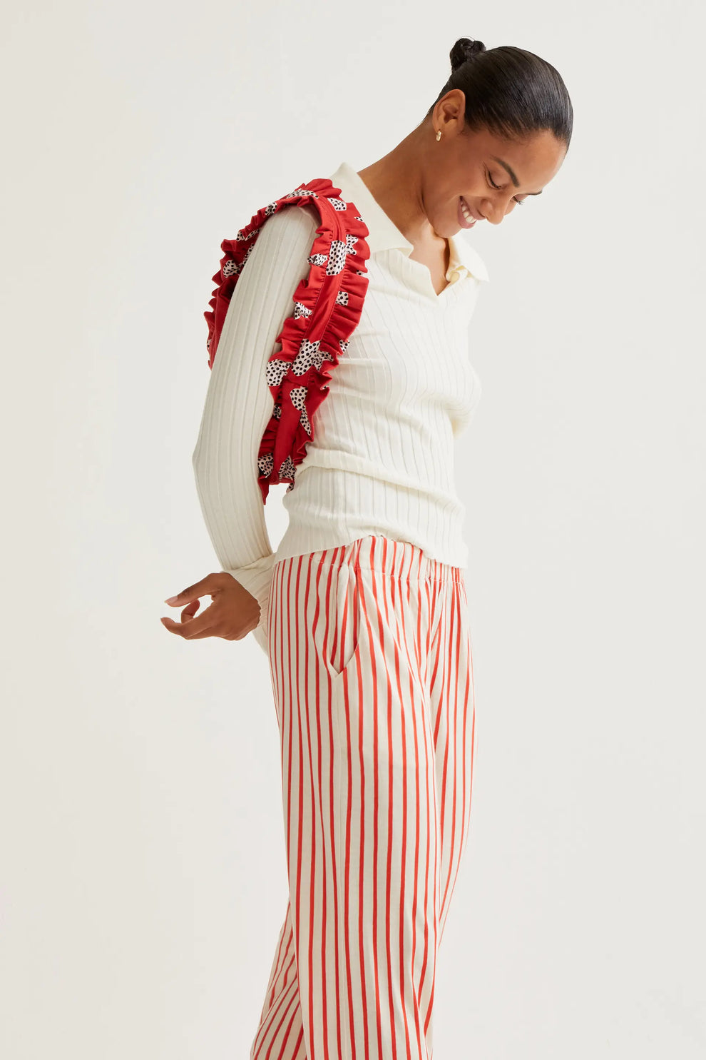 Trousers with red striped print