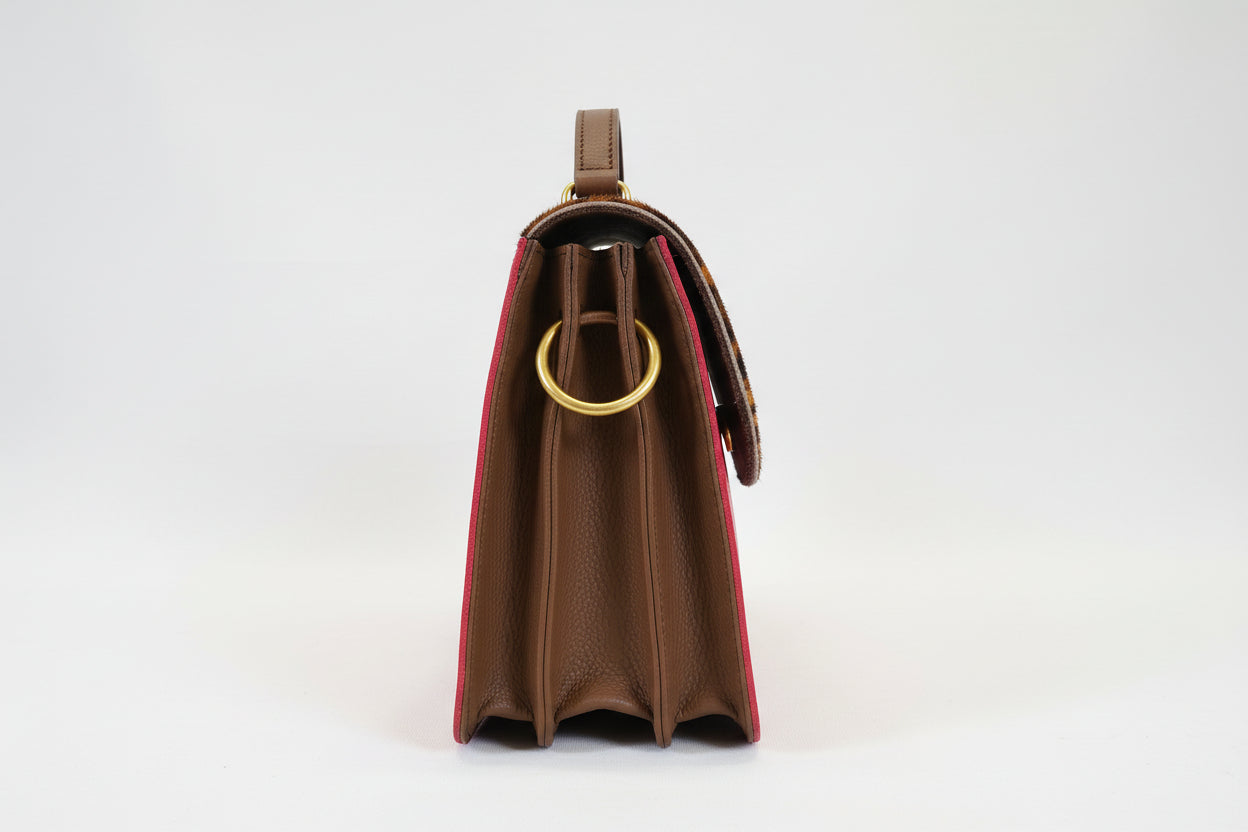 Borsa porpora monocolore con patta aninalier