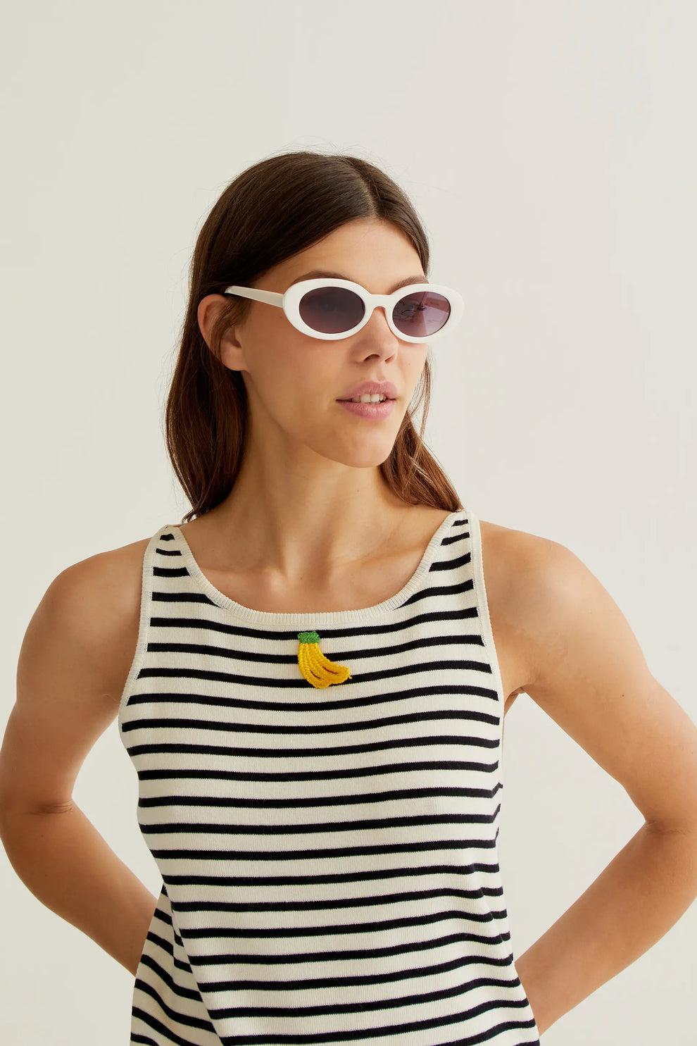 Black and white striped top with banana embroidery