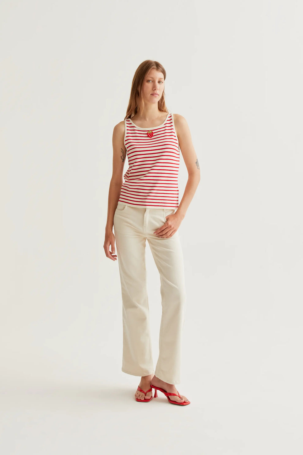 White and red striped top with strawberry embroidery