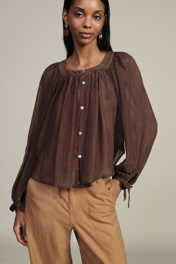 Shirt with relaxed fit and button front long sleeves