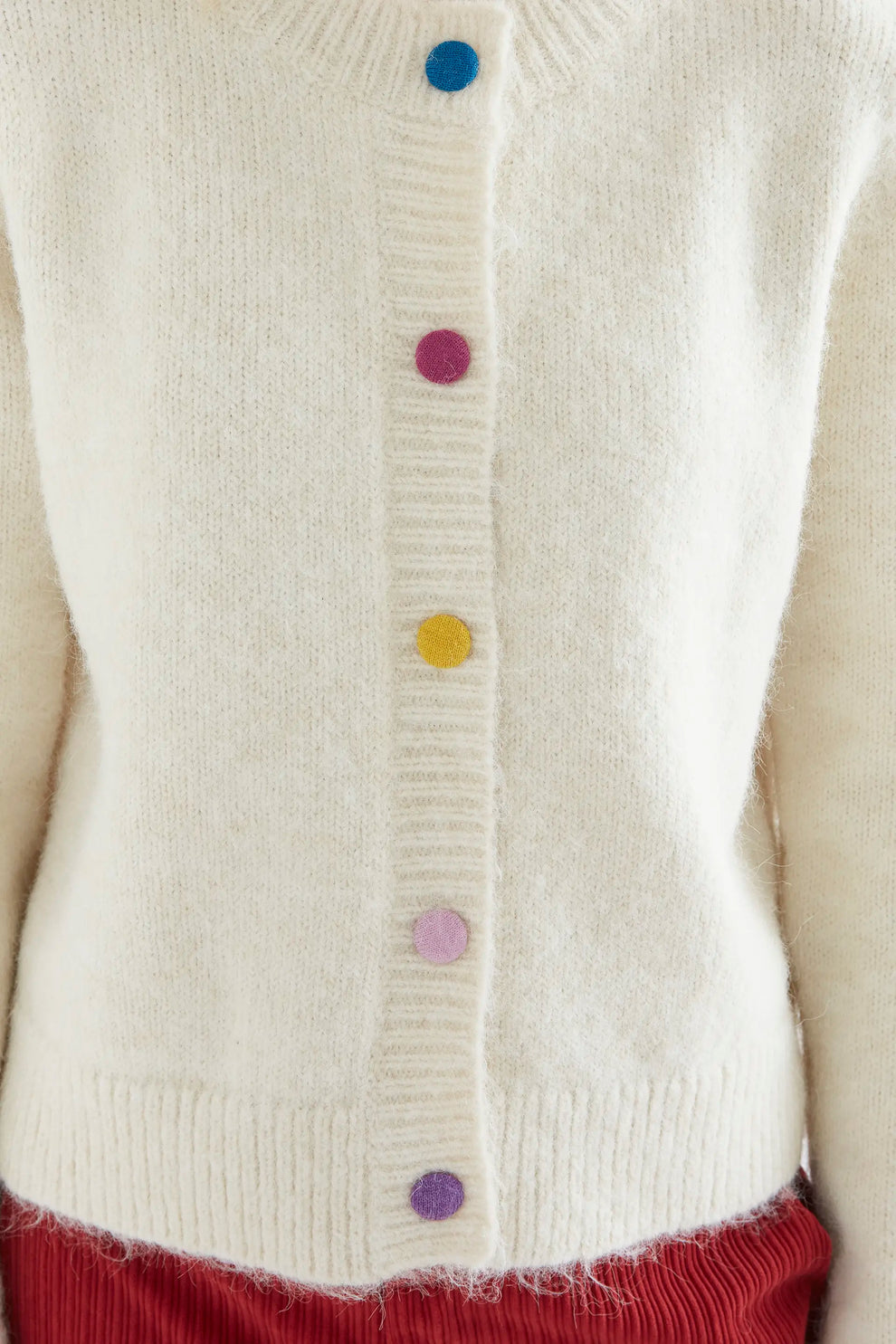Cardigan in maglia bianco panna con bottoni multicolore