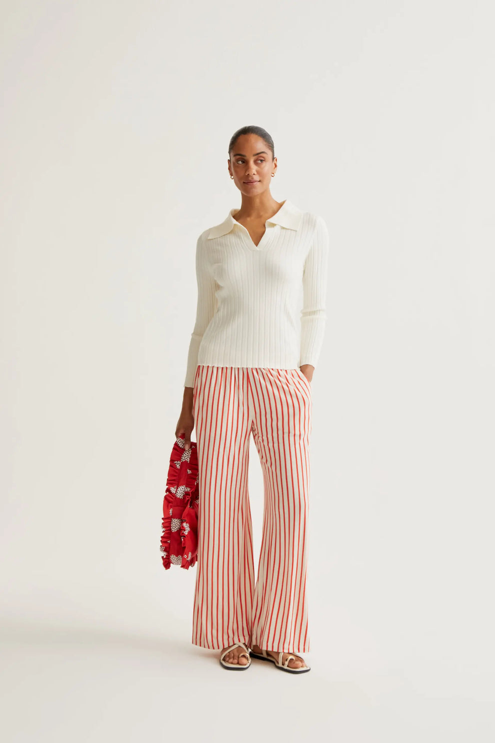 Trousers with red striped print