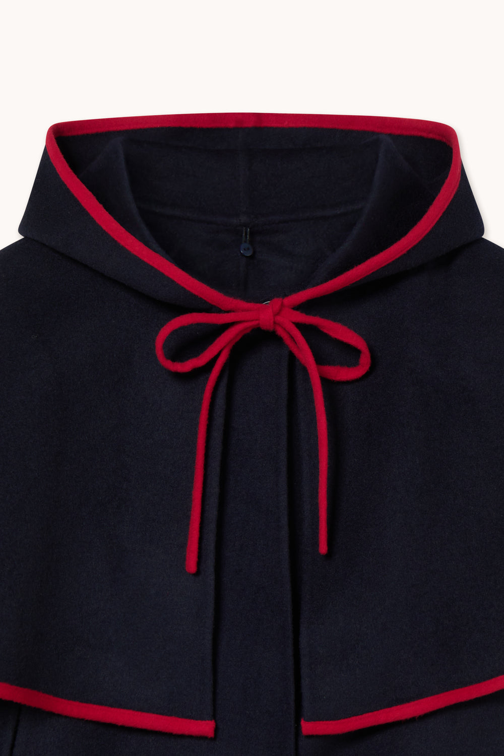 HOODED CAPE WITH CONTRAST BINDING