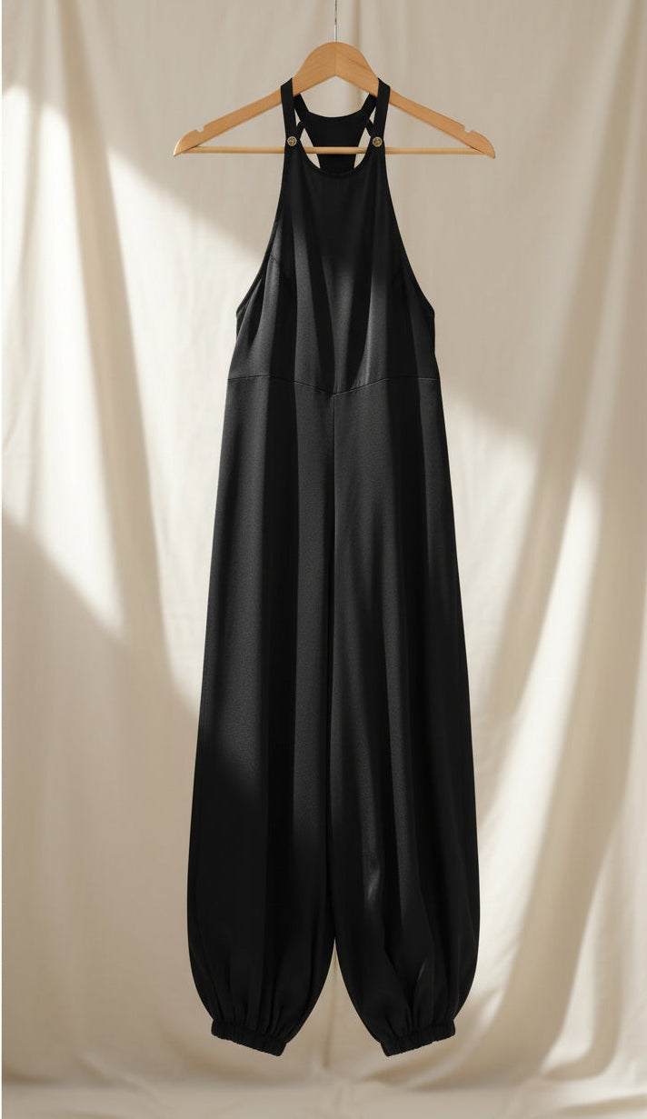 Overall ampio con spalline e fondo elasticizzato.