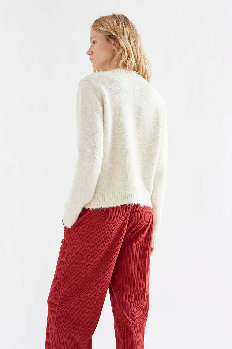 Cardigan in maglia bianco panna con bottoni multicolore