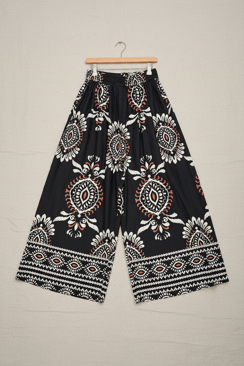 Pantalone con pinces fantasia etnica nera e burro
