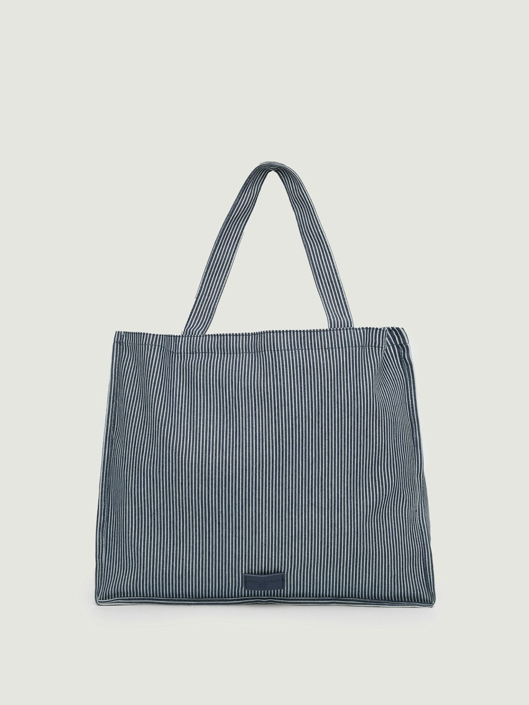 Borsa a righe con stampa di pesce