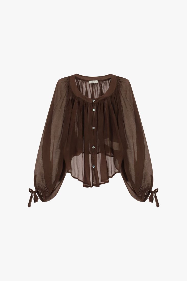 Shirt with relaxed fit and button front long sleeves
