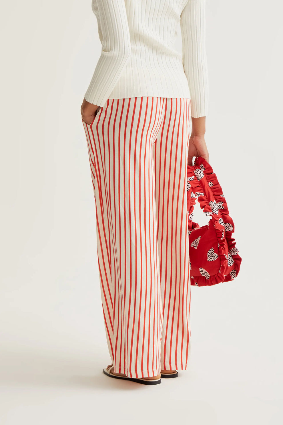 Trousers with red striped print