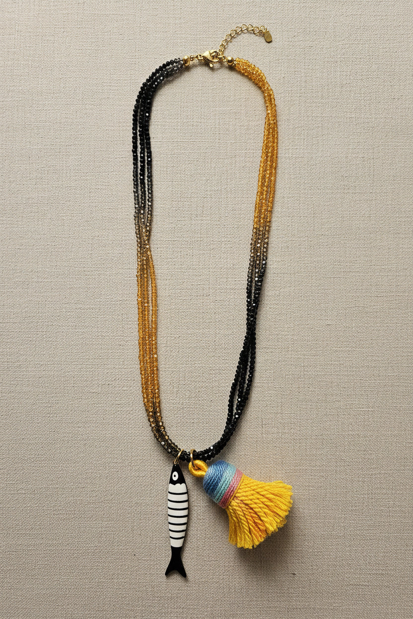 Collana con sardina e nappina bicolor nero arancio