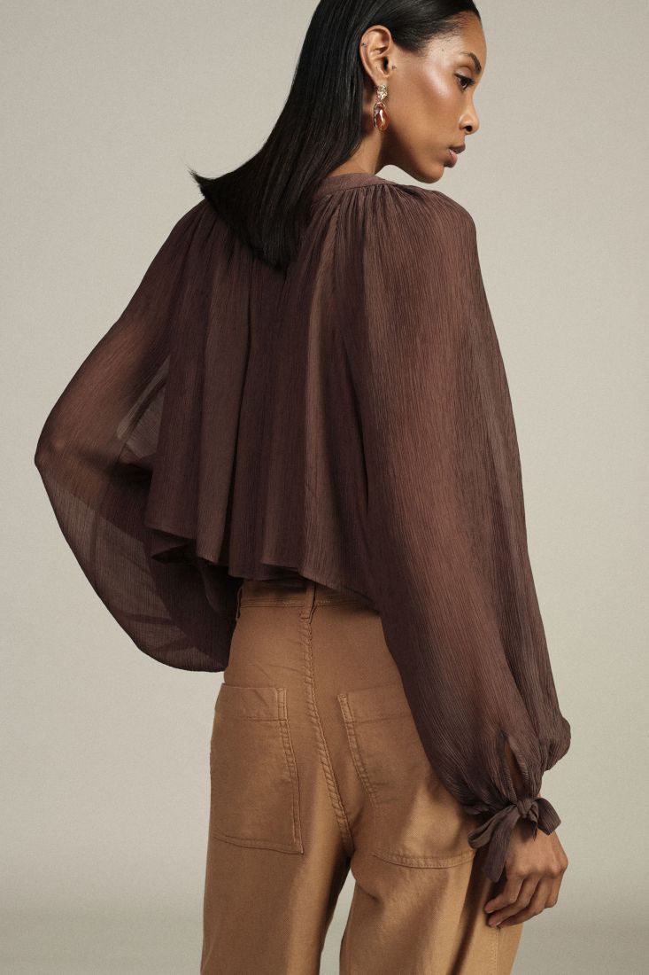 Shirt with relaxed fit and button front long sleeves
